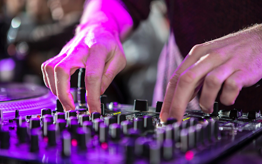 a Person Using an Audio Mixer from Chrome web store to be run with OffiDocs Chromium online a Person Using an Audio Mixer from Chrome web store to be run with OffiDocs Chromium online