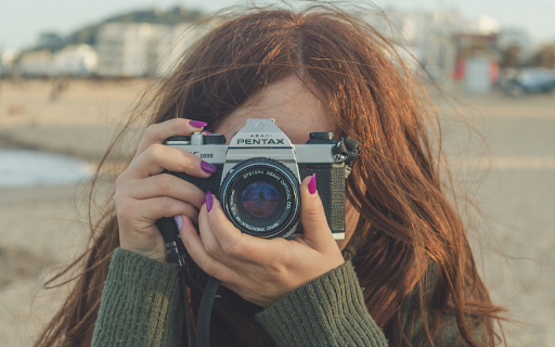 Girl taking pictures from Chrome web store to be run with OffiDocs Chromium online Girl taking pictures from Chrome web store to be run with OffiDocs Chromium online