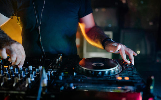 Man in Blue Crew Neck T shirt Playing Dj Controller from Chrome web store to be run with OffiDocs Chromium online Man in Blue Crew Neck T shirt Playing Dj Controller from Chrome web store to be run with OffiDocs Chromium online