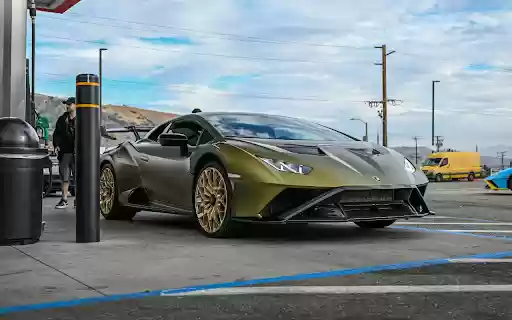 Luxury Olive Green Sports Car at a Gas Station from Chrome web store to be run with OffiDocs Chromium online Luxury Olive Green Sports Car at a Gas Station from Chrome web store to be run with OffiDocs Chromium online